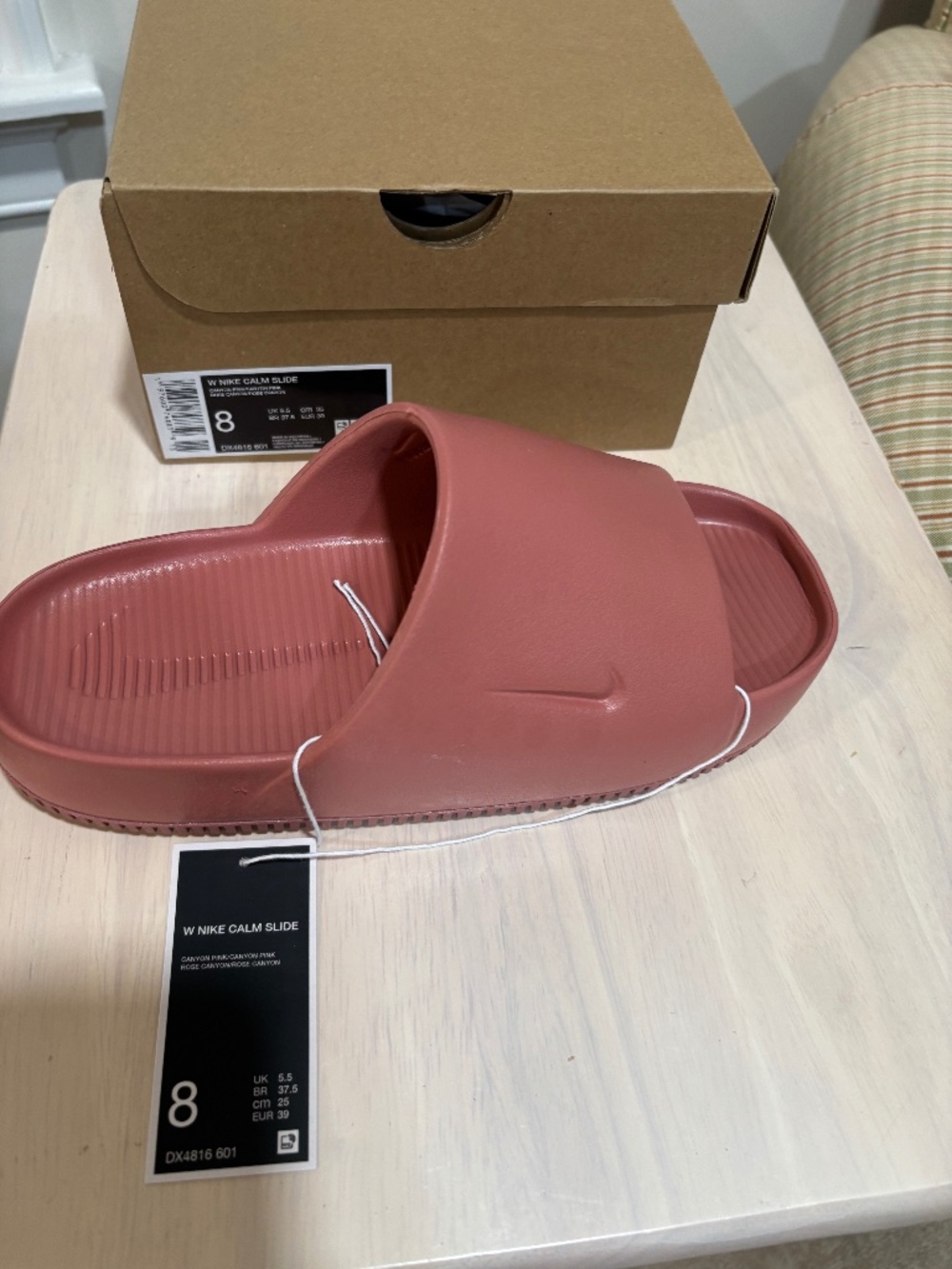 Brand new Nike Calm Slides in pink